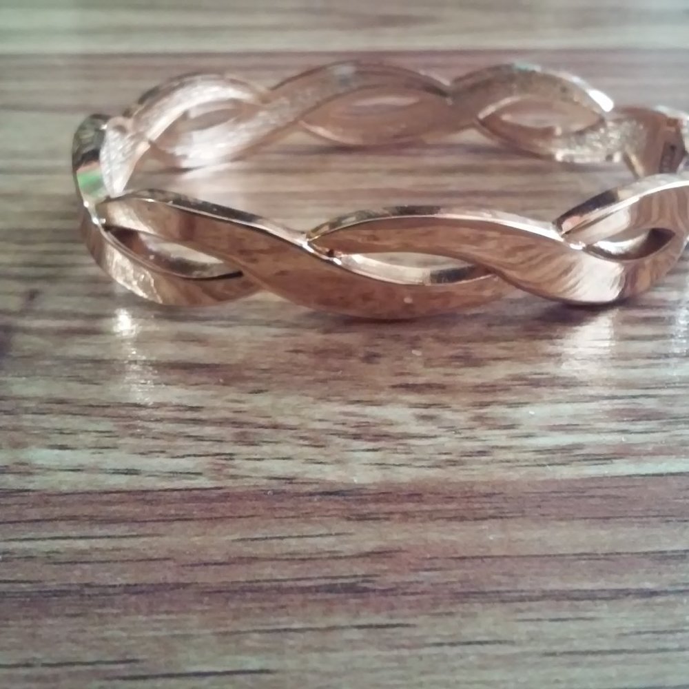 Shiny Gold Bracelet Oval Shape 2 1/2" x 2 1/8" width is 3/8" With Hinge